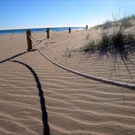 Wake To Waves In A Beachside *